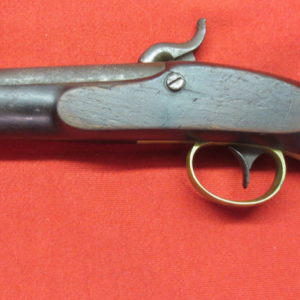 Boclock pistol lying on red surface