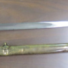 Silver and gold sword with scabbard