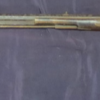 Left-Handed long shotgun