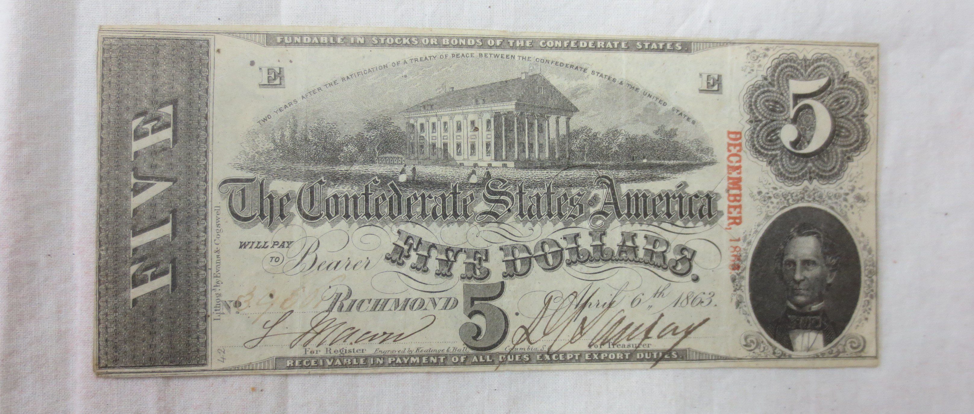 Front page of five dollars currency