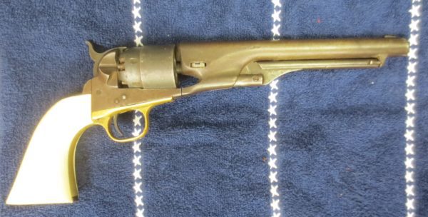 Gold colt pistol