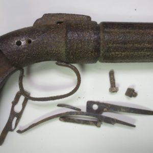 Dismantled curved pistol