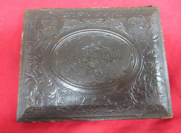 Back part of the frame with carved design