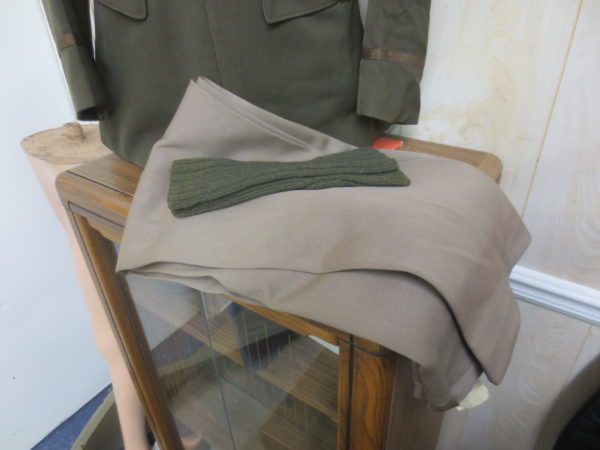 Folded trouser with some army green cloth