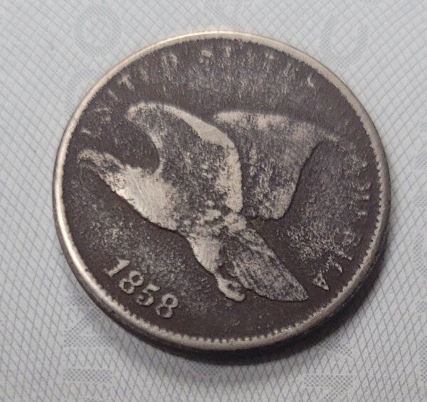 Civil War era Flying eagle penny 1858 coin found in Confederate camp at Fredericksburg, Virginia